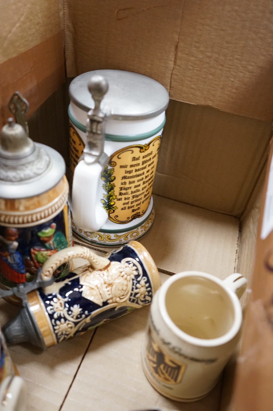 A collection of German ale steins and an Imari seated cat-37cm high